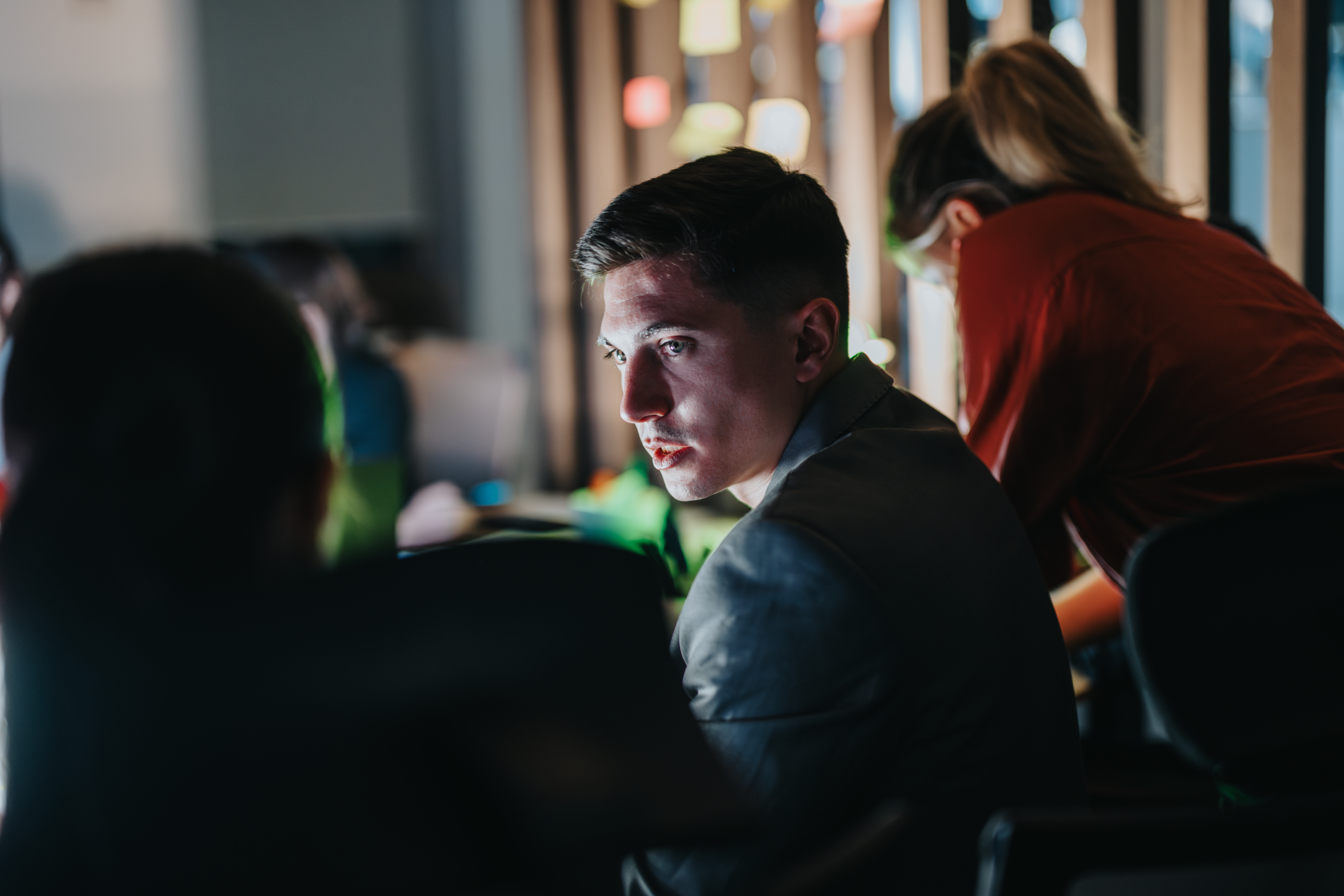 Enterprise security professional evaluating risk and strategy during a cybersecurity and technology planning discussion.